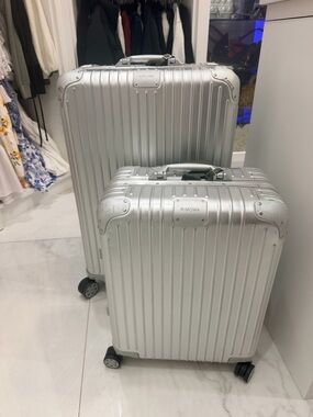 RIMOWA Silver Aluminum Carry-On and Medium Spinner Set